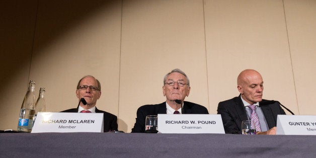 GENEVA, Nov. 10, 2015-- Richard Pound, center, president of World Anti-Doping Agency Independent Commission, members of Inde