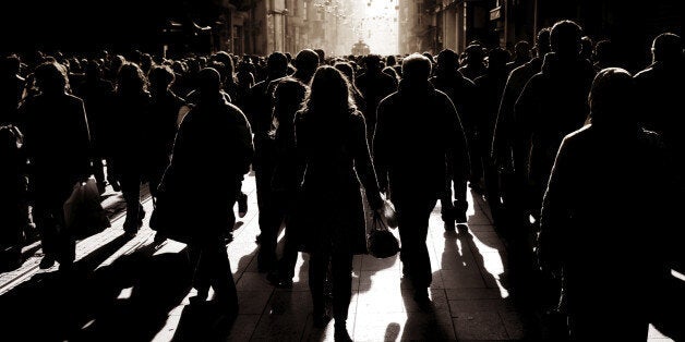 silhouetted people walking on busy street in istanbul,Turkey.