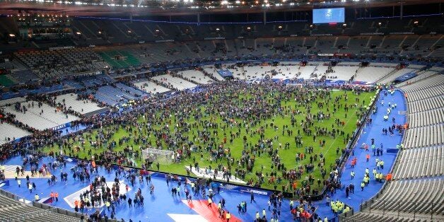 Spectators invade the pitch of the Stade de France stadium after the international friendly soccer France against Germany, Fr