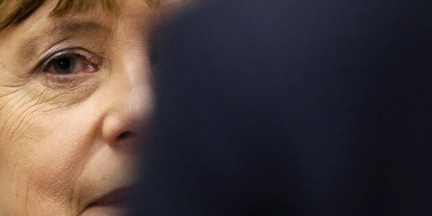 German Chancellor Angela Merkel arrives to a special faction meeting of the Christian Union parties at the Reichstag building