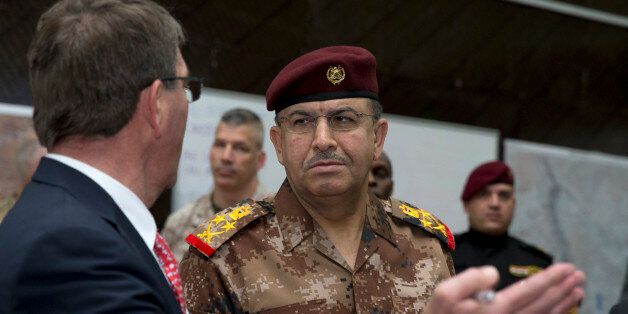 BAGHDAD, IRAQ - JULY 23: U.S. Defense Secretary Ash Carter, left, and Gen. Taleb Shegati Al-Kenani, commander of the Counter Terrorism forces, meet at the Combined Joint Operations Center in Baghdad, Iraq, Thursday, July 23, 2015. Carter is on a weeklong tour of the Middle East focused on reassuring allies about Iran and assessing progress in the coalition campaign against the Islamic State group in Syria and Iraq. (Photo by Carolyn Kaster - Pool/Getty Images)