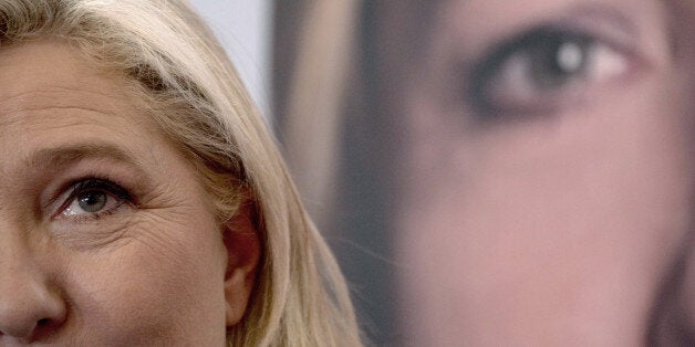 France's far-right National Front (FN) leader Marine Le Pen holds a press conference in Lille on December 7, 2015, a day afte