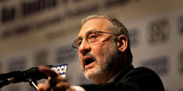 **FILE** Nobel Laureate Joseph Stiglitz, delivers keynote address at the national seminar on 'Making Globalization Work: An Indian Perspective organized by Federation of Indian Chambers of Commerce and Industry, in New Delhi, India, in this Dec. 18, 2006 file photo. The U.S. could face a prolonged economic downturn due to its subprime mortgage woes, but is unlikely to plunge into a recession, Nobel economics laureate Joseph Stiglitz said Thursday, Aug. 30, 2007. (AP Photo/Manish Swarup, file)