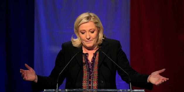 Far Right National Front party leader Marine Le Pen delivers her speech after the results of the second round of the regional elections in Henin-Beaumont, northern France, Sunday Dec.13, 2015. Marine Le Pen's far-right National Front collapsed in French regional elections Sunday after dominating the first round of voting, according to pollsters' projections. (AP Photo/Thibault Camus)