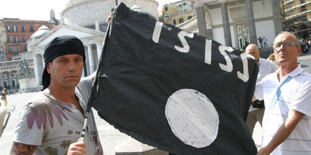 NAPLES, ITALY - 2015/09/14: The unpaid workers from Consorzio Unico di Bacino show a black ISIS flag during a provocative pro