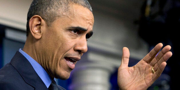 President Barack Obama speaks during a news conference in the White House Brady Press Briefing Room, in Washington, Friday, D