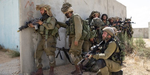 Israeli army soldiers take part in training at the Urban Warfare Training Centre (UWTC) in Tse'elim camp in southern Israel o
