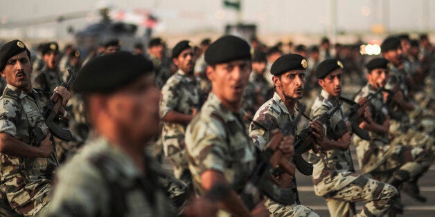 FILE - In this Thursday, Sept. 17, 2015 file photo, Saudi security forces take part in a military parade in preparation for the annual Hajj pilgrimage in Mecca, Saudi Arabia. Saudi Arabia said Tuesday, Dec. 15, 2015 that 34 nations have agreed to form a new "Islamic military alliance" to fight terrorism with a joint operations center based in the kingdom's capital, Riyadh. (AP Photo/Mosa'ab Elshamy, File)