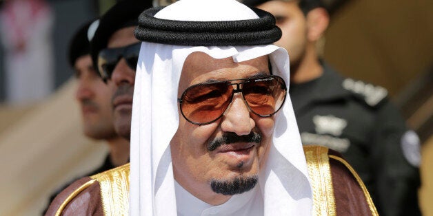 King Salman of Saudi Arabia waits to receive leaders during their arrival to participate in a summit of Arab and South Americ