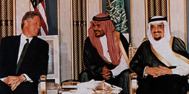 ** FILE ** Saudi Arabia's King Fahd right, talks with U. S. president Bill Clinton in this undated file photo. Saudi Arabia's King Fahd, who moved his country closer to the United States but ruled the world's largest oil producing nation in name only since suffering a stroke in 1995, died early Monday Aug. 1, 2005, the Saudi royal court said. He was said to be 84. (AP Photo/ Saudi Gazette)