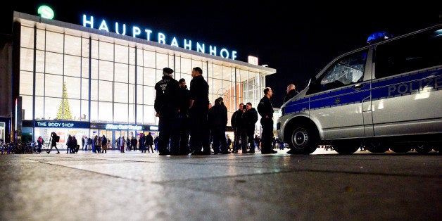 COLOGNE, GERMANY - JANUARY 09: Police stand guard in front of Hauptbahnhof main railway station after an Pegida, Hogesa (Hoo
