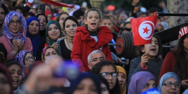 TUNIS, TUNISIA - JANUARY 14: Tunisians listen to Lebanese origin Swedish singer Maher Zain during a concert at the Habib Bourguiba street as part of the celebrations of the 5th anniversary of the revolution in Tunis, Tunisia on January 14, 2016. (Photo by Yassine Gaidi/Anadolu Agency/Getty Images)