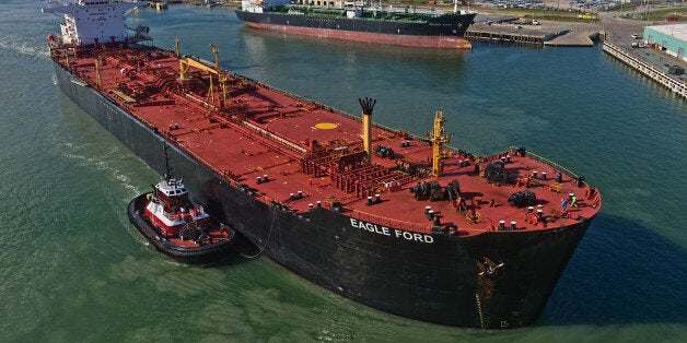 The Eagle Ford crude oil tanker sails out of the the NuStar Energy dock at the Port of Corpus Christi in Corpus Christi, Texas, U.S., on Thursday, Jan. 7, 2016. Crude oil slid Thursday to the lowest level since December 2003 as turbulence in China, the worlds biggest energy consumer, prompted concerns about the strength of demand. Photographer: Eddie Seal/Bloomberg via Getty Images