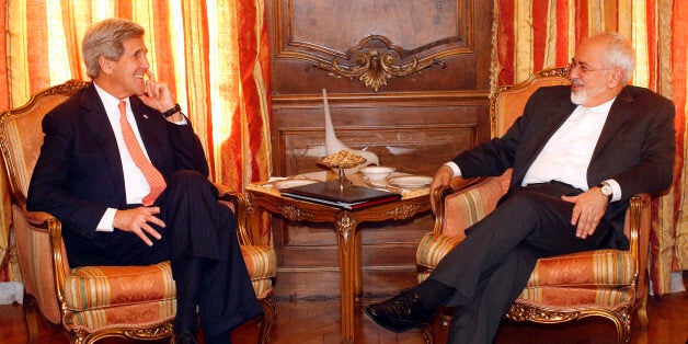 NEW YORK, NY - APRIL 27: U.S. Secretary of State John Kerry (L) meets with Iranian Foreign Minister Mohammad Javad Zarif at the United Nations April 27, 2015, in New York City. The two were meeting at the opening of a UN conference on a global anti-nuclear weapons treaty, attempting to make progress in talks on a long-term nuclear deal. (Photo by Jason DeCrow-Pool/Getty Images)