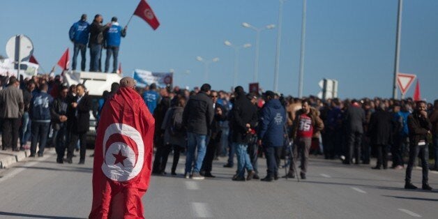 TUNIS, TUNISIA - JANUARY 25: A group of security forces member stage a demonstration, demanding higher wages, in front of the Cartghage Palace in Tunis, Tunisia on January 25, 2016. (Photo by Amine Landoulsi/Anadolu Agency/Getty Images)