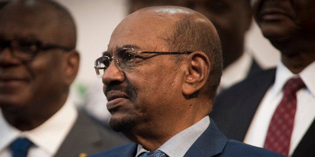 Sudanese president Omar al-Bashir is seen during a photo op at the African Union summit in Johannesburg, Sunday June 14 2015. A South African judge on Sunday ordered authorities to prevent al-Bashir from leaving the country because of an international order for his arrest, human rights activists said.(AP Photo/Shiraaz Mohamed)