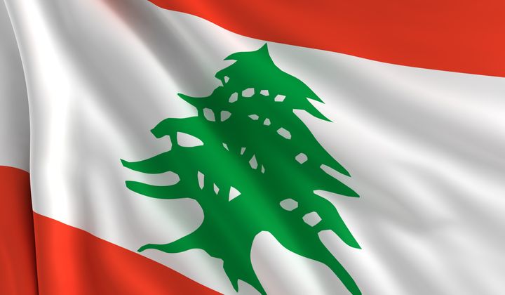 a flag of lebanon in the wind