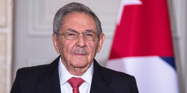 Cuban President Raul Castro attends an agreements' signing ceremony with French President Francois Hollande during a meeting at the Elysee Palace in Paris, France, Monday, Feb. 1, 2016. Cuban President Raul Castro is paying a state visit to France, in the first European foray by a Cuban leader in two decades, as Cuba opens up its economy. (Etienne Laurent, Pool photo via AP)