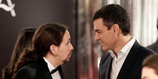 Leader of left-wing party 'Podemos' Pablo Iglesias (L) looks at leader of Spanish Socialist Party (PSOE) Pedro Sanchez as they attend the 30th Goya film awards ceremony in Madrid on February 6, 2016. AFP PHOTO / JAVIER ORTEGA PONCE / AFP / JAVIER ORTEGA PONCE (Photo credit should read JAVIER ORTEGA PONCE/AFP/Getty Images)