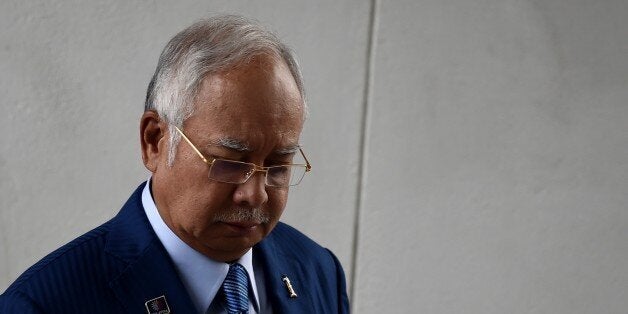 To go with Malaysia-politics-corruption-Saudi,FOCUS by Dan Martin
Malaysia's Prime Minister Najib Razak leaves his office a