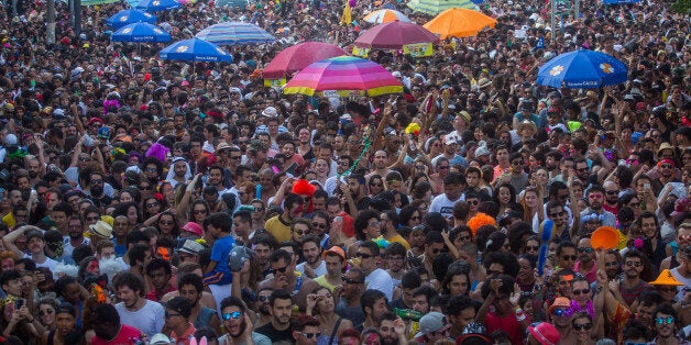 SAO PAULO, BRAZIL - FEBRUARY 9: Revellers participate in the Carnival group parade honoring the singer David Bowie through t