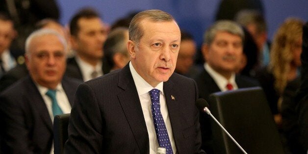 ISTANBUL, TURKEY - FEBRUARY 23: President of Turkey Recep Tayyip Erdogan delivers a speech during 'High Level Partnership Forum focusing on progress in Somalia' at Conrad hotel in Istanbul, Turkey on February 23, 2016. (Photo by Berk Ozkan/Anadolu Agency/Getty Images)