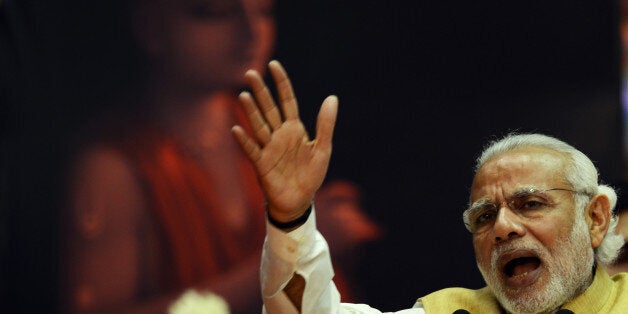 Indian Prime Minister Narendra Modi speaks during the centenary celebration of missionary organisation the Gaudiya Math and Mission at the Netaji Indoor Stadium in Kolkata on February 21, 2016. AFP PHOTO / Dibyangshu SARKAR / AFP / DIBYANGSHU SARKAR (Photo credit should read DIBYANGSHU SARKAR/AFP/Getty Images)