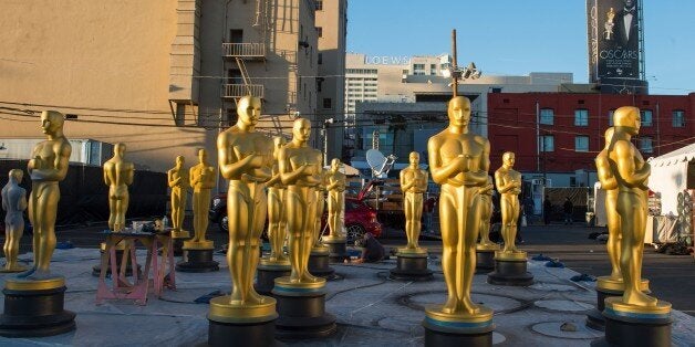 Oscar statuettes are seen as workers make preparations for the 88th Annual Academy Awards at Hollywood & Highland Center, Hollywood, California, on February 24, 2016. / AFP / VALERIE MACON (Photo credit should read VALERIE MACON/AFP/Getty Images)