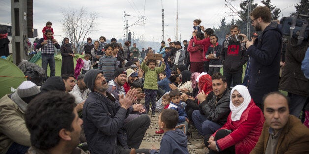 IDOMENI, GREECE - 2016/03/12: Thousands of refugees from Syria are locked in Idomeni on the border between Greece and Macedon