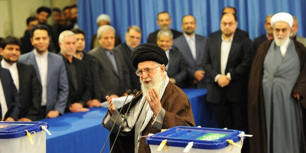 TEHRAN, IRAN - FEBRUARY 26: Iran's Supreme Leader Ayatollah Seyyed Ali Khamenei casts the first ballot in key elections for Parliament and the Assembly of Experts in Tehran, Iran, on February 26, 2016. Mr. Khamenei called on Iranians to vote en masse to 'ruin the hopes of the enemies.' The vote is essentially a referendum on the agenda of centrist President Hassan Rouhani, whose allies are trying to ease the grip of hardliners over many levers of government. (Photo by Scott Peterson/Getty Images)