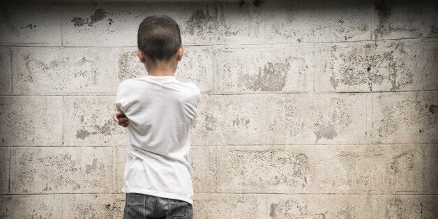 Young Asian boy being physically abused, he is also likely to be emotionally abused. He has no one to stand up and fight for him, his rights or his future.