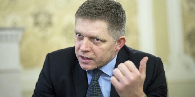 Robert Fico, Slovakia's prime minister, gestures whilst speaking during an interview at his office in Bratislava, Slovakia, on Tuesday, Feb. 23, 2016. Fico, whose country takes over the rotating European Union presidency in July, said he cant imagine how Europe would handle such a siege if migrants from Ukraine join those heading to the continent from the Middle East, Africa and Asia. Photographer: Balazs Mohai/Bloomberg via Getty Images