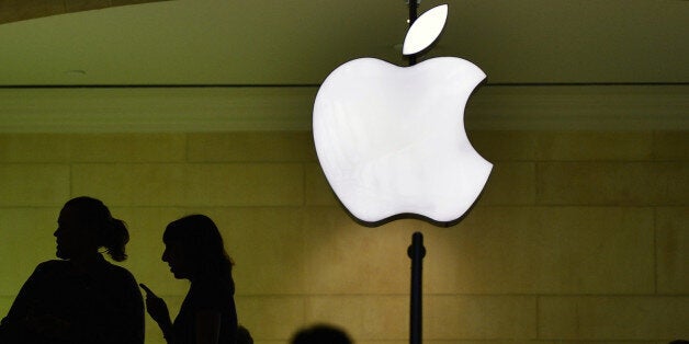 NEW YORK, March 2, 2016-- Customers visit the Apple store of the Grand Central Terminal in New York, the United States, March 1, 2016. On Feb. 29, 2016, a magistrate judge of the United States District Court for the Eastern District of New York adjudged that All Writs Act wasn't sufficient to order Apple to help the Federal Bureau of Investigation (FBI) unlock the phone of a convicted drug dealer. (Xinhua/Wang Lei via Getty Images)