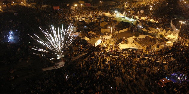 Fireworks light up the sky above Cairo's Tahrir square during continuing protests against Egypt's military rulers late on November 24, 2011, as members of Egypt's ruling military council rejected calls to step down immediately, saying it would amount to a 'betrayal' as anti-military protests entered their seventh day. AFP PHOTO/MAHMUD HAMS (Photo credit should read MAHMUD HAMS/AFP/Getty Images)