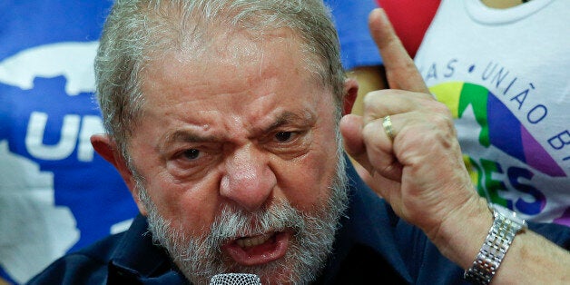 Brazil's former President Luiz Inacio Lula da Silva speaks during a press conference at the Workers Party headquarters in Sao Paulo, Brazil, Friday, March 4, 2016. Brazilian police acting on a warrant questioned the former president and searched his home and other properties, in the most recent development yet in the sprawling corruption case at the oil giant Petrobras. (AP Photo/Andre Penner)