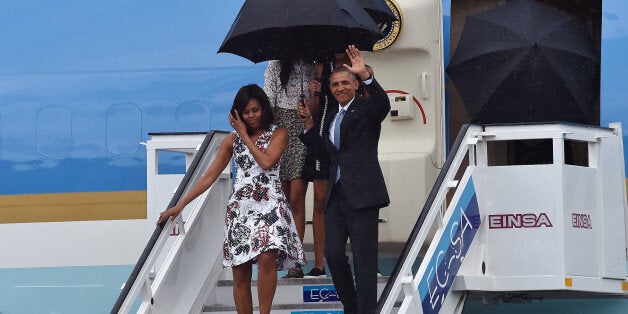 HAVANA, CUBA - MARCH 20: First lady Michelle Obama, President Barack Obama, Malia Obama and Sasha Obama arrive at Jose Marti International Airport for a 48-hour visit on Airforce One on March 20, 2016 in Havana, Cuba. After resumption of diplomatic relations between countries Barack Obama is the first US president to visit Havana since Calvin Coolidge in 1928. (Photo by Anatoly Zhdanov/Kommersant Photo via Getty Images)