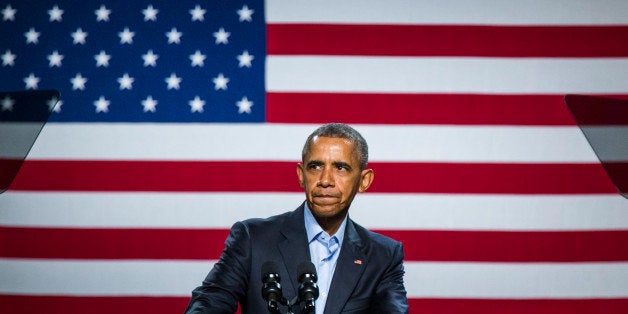 DALLAS, TX - MARCH 12: U.S. President Barack Obama speaks at a private Democratic National Committeeevent at Gilley's Club Dallas on March 12, 2016 in Dallas, Texas. The president spoke a day after protesters forced Republican presidential candidate Donald Trump to cancel a campaign event in Chicago on Friday. (Photo by Ashley Landis-Pool/Getty Images)