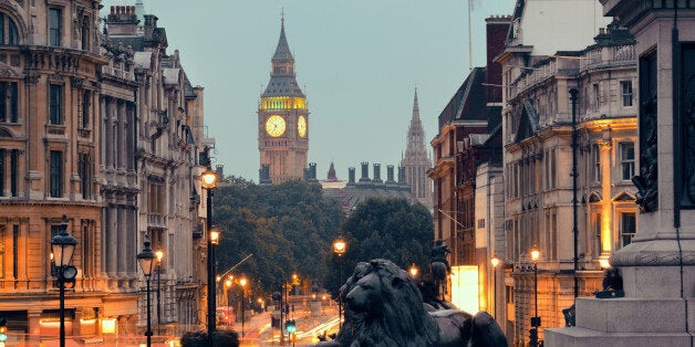 Street view of Trafalgar Square at night in London