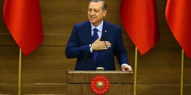 ANKARA, TURKEY - APRIL 6: Turkish President Recep Tayyip Erdogan addresses neighborhood leaders (mukhtars) during the mukhtars meeting at the Presidential Complex in Ankara, Turkey, on April 6, 2016. (Photo by Okan Ozer/Anadolu Agency/Getty Images)