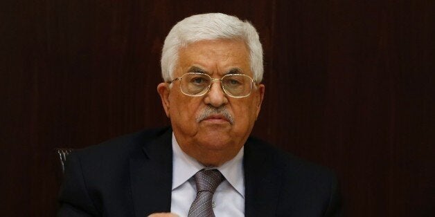 Palestinian president Mahmud Abbas chairs a meeting of the executive committee of the Palestine Liberation Organisation (PLO) in the West Bank city of Ramallah on April 4, 2016. / AFP / ABBAS MOMANI (Photo credit should read ABBAS MOMANI/AFP/Getty Images)