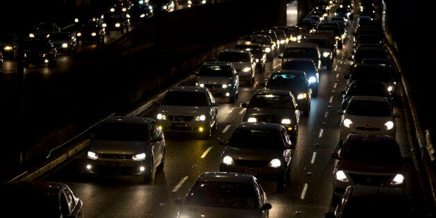 Cars sit in evening rush hour traffic in Mexico City, Wednesday, March 30, 2016. Metropolitan authorities on Wednesday temporarily ordered all cars to remain idle one day a week in response to this notoriously smoggy capital's worst air-quality crisis in over a decade. (AP Photo/Rebecca Blackwell)