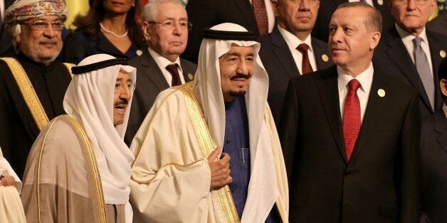 ISTANBUL, TURKEY - APRIL 14: (Front L to R) Emir of Kuwait Sheikh Sabah Al-Ahmad Al-Jaber Al-Sabah, Saudi King Salman bin Abdulaziz Al Saud and Turkish President Recep Tayyip Erdogan pose for a family photo piror to the opening session of the 13th Organization of Islamic Cooperation (OIC) Summit at Istanbul Congress Center (ICC), in Istanbul, Turkey on April 14, 2016. Istanbul hosts the two-day 13th OIC Summit on the April 14-15, 2016 with the attendance by prime ministers and presidents from over 30 countries. (Photo by Veli Gurgah/Anadolu Agency/Getty Images)