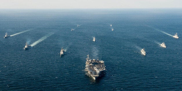 U.S. and South Korean naval ships traverse the ocean in formation as part of Foal Eagle 2016 in the waters surrounding the Ko