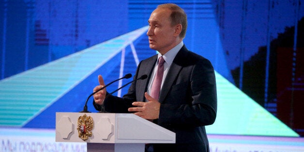 MOSCOW, RUSSIA - DECEMBER,22: (RUSSIA OUT) Russian President Vladimir Putin speaks during the 2015 Russian Internet Economy Forum at Moscow's World Trade Center on December 22, 2015 in Moscow, Russia. The Russian President took part in the plenary session of the first Russian Internet Economy Forum. (Photo by Sasha Mordovets/Getty Images)