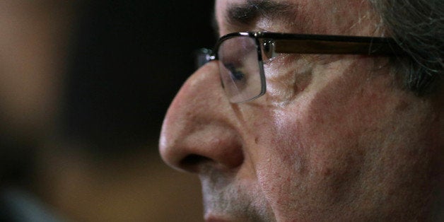 Brazil's President of the Chamber of Deputies Eduardo Cunha speaks about his name appearing in the documents leaked from the Panamanian Mossack-Fonseca law firm, at the Chamber of Deputies, in Brasilia, Brazil, Monday, April 4, 2016. A leak of 11.5 million documents from the Panama-based law firm offers a glimpse into the shadowy world where the rich and powerful hide their money, raising sharp questions about the use of shell companies that obscure the identities of their true owners. (AP Photo/Eraldo Peres)