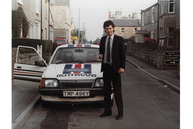 Simon Neale with his Rothmans-branded car.