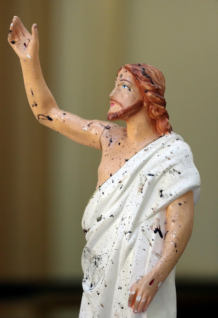 Blood stains are seen on a statue of Jesus Christ at St. Sebastian Catholic Church, after bomb blasts ripped through churches and luxury hotels on Easter, in Negombo, Sri Lanka April 22, 2019. 