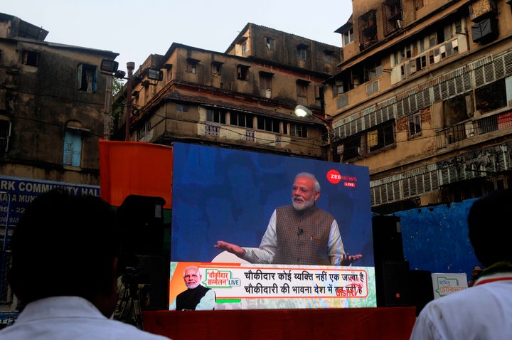 People attend Prime Minister Narendra Modi's 'Mai Bhi Chowkidar' event, through a video conference initiative at Burrabazar, on 31 March 2019 in Kolkata.