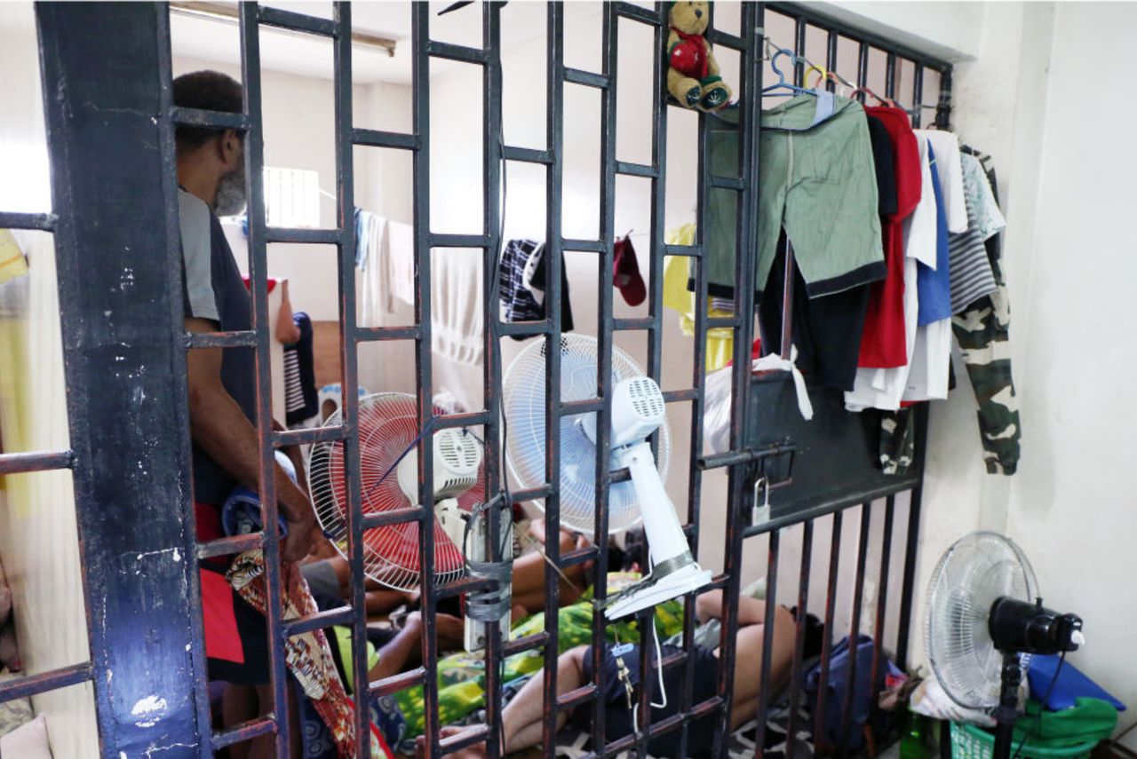 Suspects in cases involving violence against women and children are held in this cell at Philippine National Police headquarters in Manila before their court hearings.