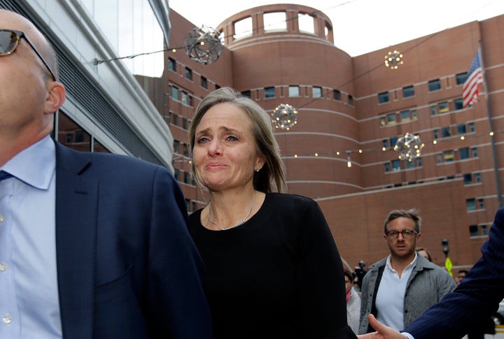 District Judge Shelley M. Richmond Joseph departs federal court, Thursday, April 25, 2019, in Boston after facing obstruction